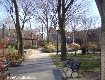 Van Vorst Park in Jersey City has benches, flower gardens, walkways and a dog run