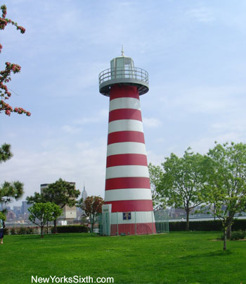 Lefrak Light stands on Hudson River coastline bordering Newport in Jersey City