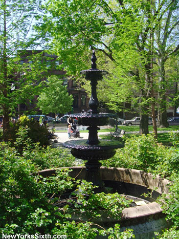A Victorian era fountain spouts water in the western end of Van Vorst Park in downtown Jersey City