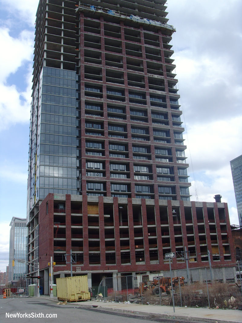 The Athena Development group's Jersey City condominium tower, A, is half covered in glass