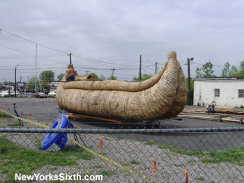 A viking ship made from reeds is constructed near the Morris Canal in downtown Jersey City
