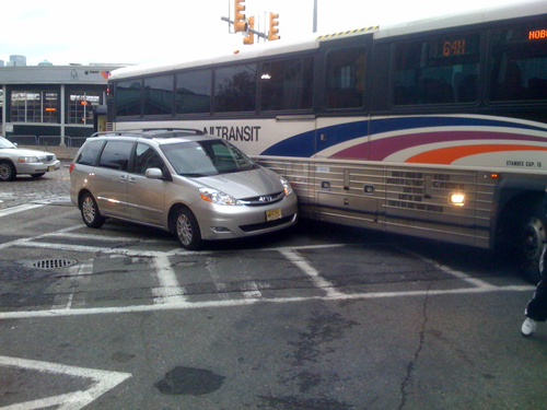 a NJ Transit bus strikes a car at Hoboken terminal snarling traffic